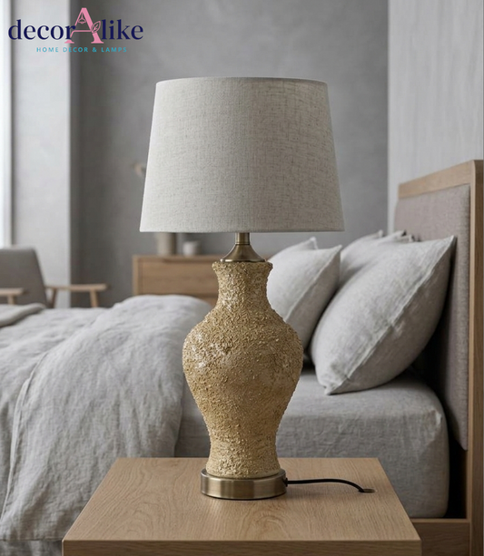 Textured sandstone-finish urn table lamp with linen shade – antique brass base – Decoralike Lahore