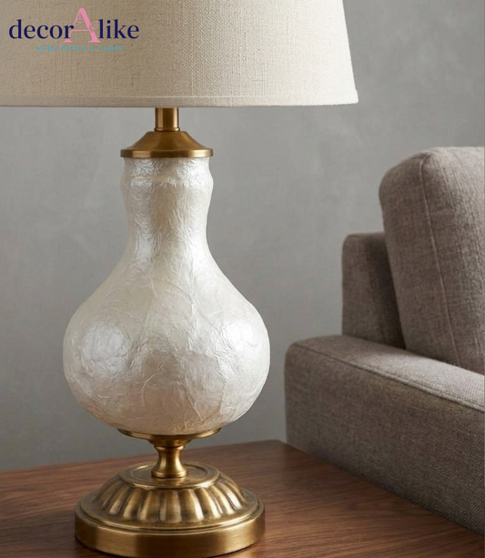 White mother of pearl table lamp with fluted antique brass pedestal base and beige linen shade — bedside lamp Pakistan
