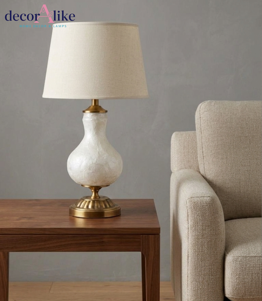 White mother of pearl table lamp with fluted antique brass pedestal base and beige linen shade — bedside lamp Pakistan