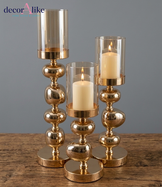 Set of 3 gold stacked ball candle holders with glass hurricanes luxury modern decor - DecorAlike Pakistan