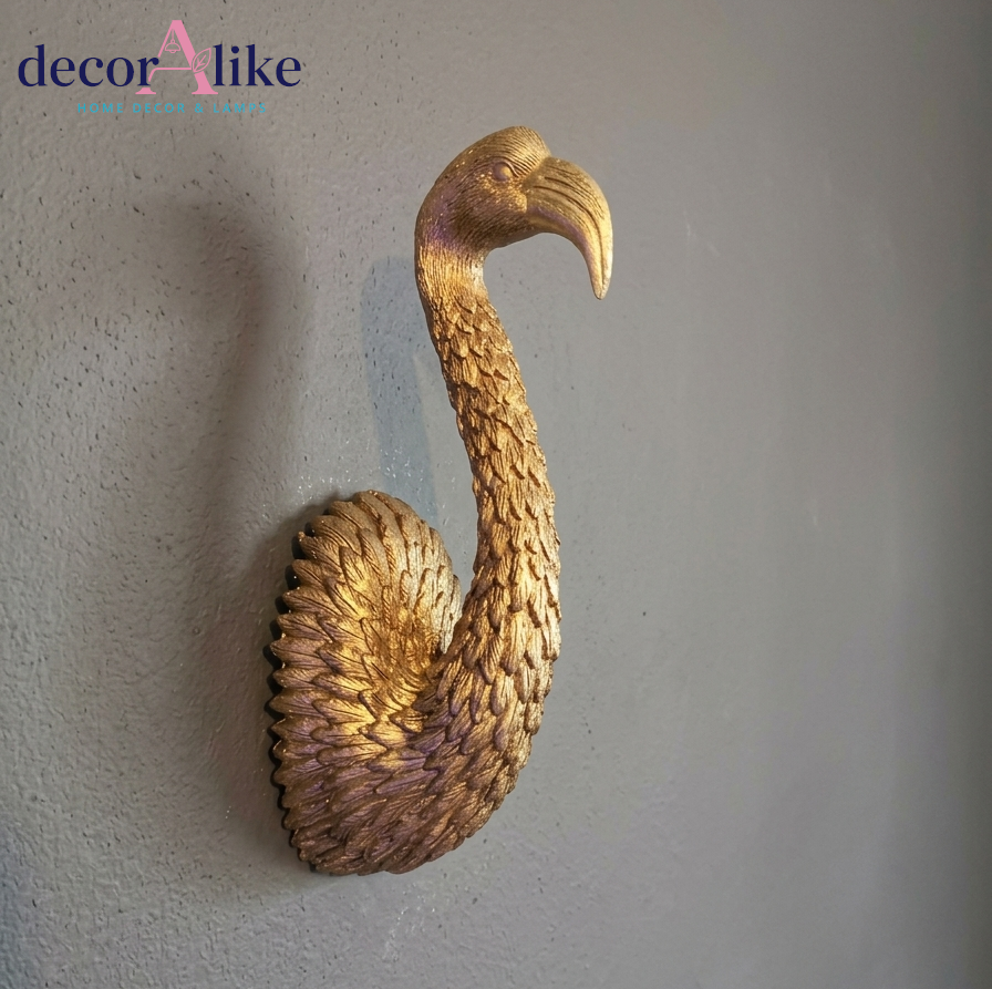 Gold flamingo wall sculpture with curved neck design – Decoralike Lahore