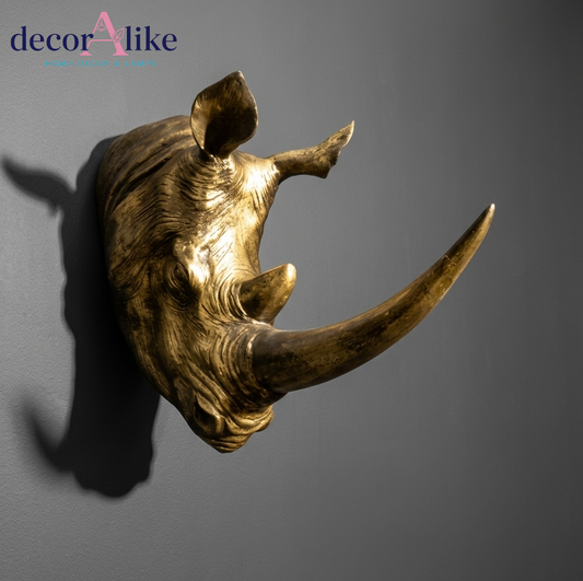 Gold rhino head wall sculpture with textured horn design – Decoralike Lahore