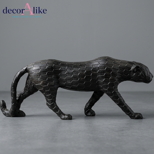 Black faceted leopard sculpture in prowling pose – Decoralike Lahore