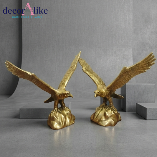 gold eagle sculptures on rock base – Decoralike Lahore
