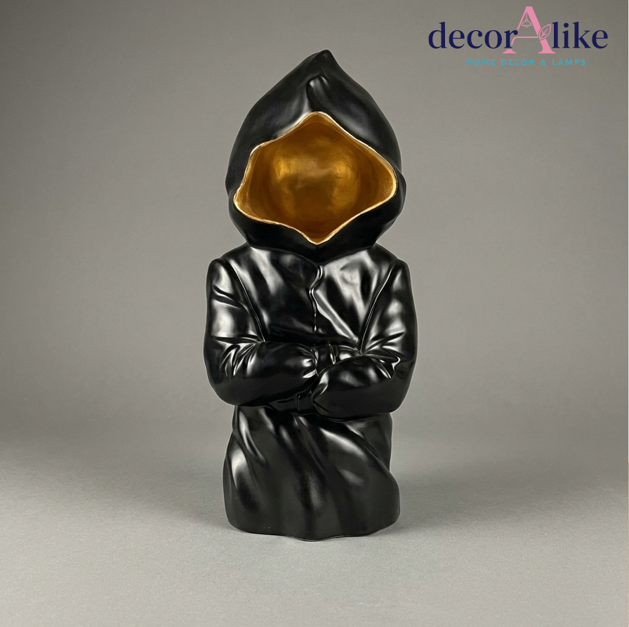 Mysterious hooded figure sculpture with gold interior – Decoralike Lahore