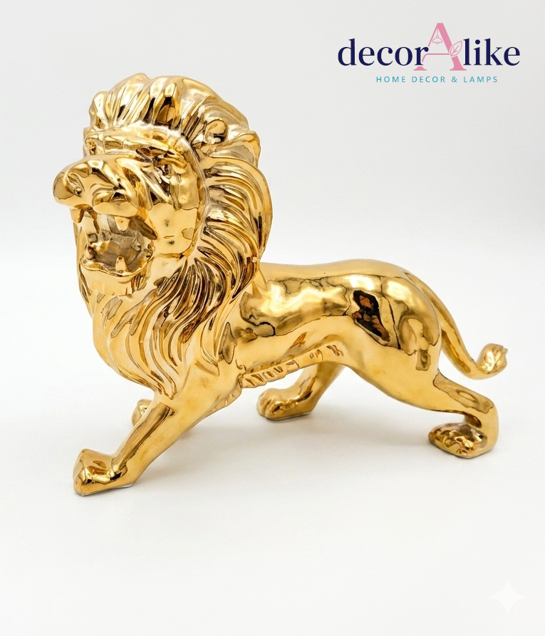 Polished gold lion sculpture in striding pose – Decoralike Lahore
