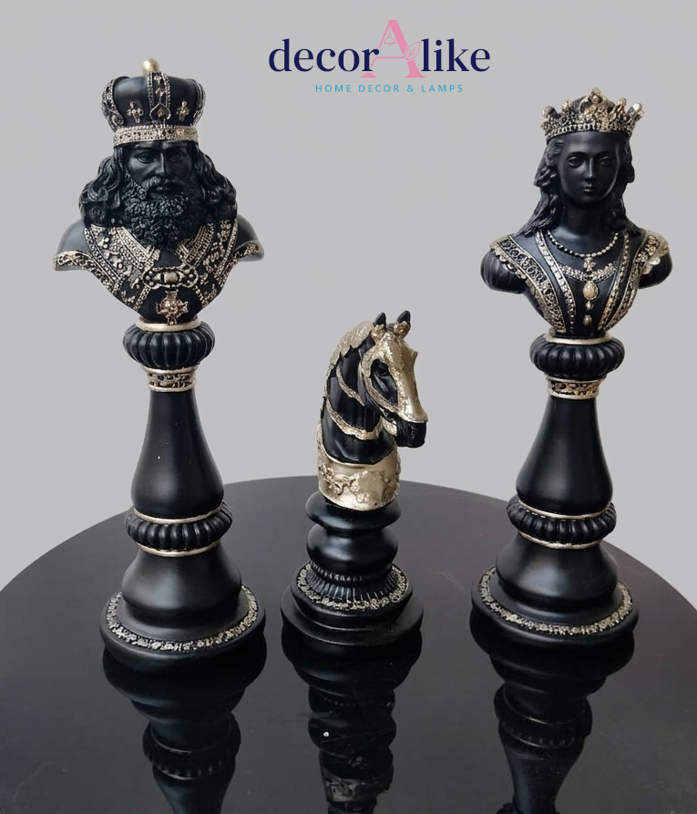 Black and gold chess piece bust set featuring King, Queen and Knight statues