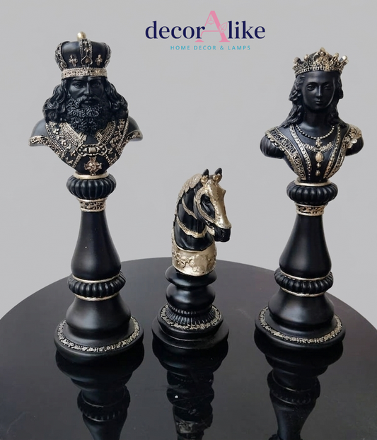 Black and gold chess piece bust set featuring King, Queen and Knight statues