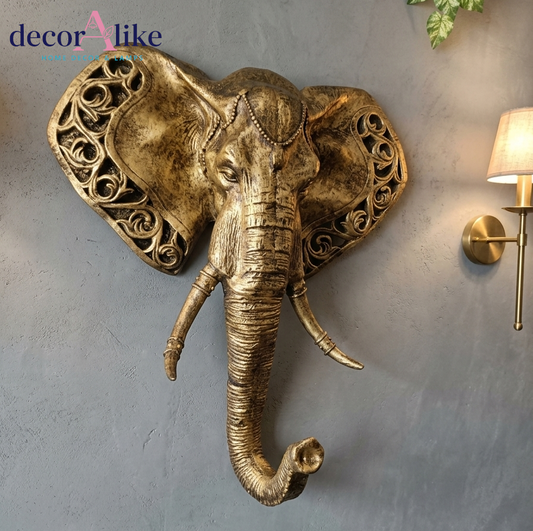 Gold elephant head wall sculpture with filigree ears – Decoralike Lahore