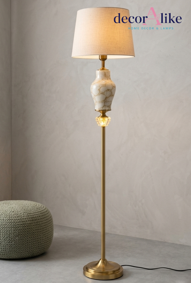 Marble effect ceramic floor lamp with gold brass column and ivory linen shade