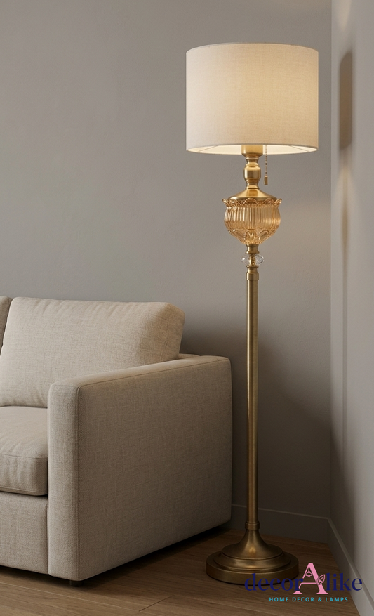 Antique brass floor lamp with amber glass urn detail and linen shade - traditional lighting Pakistan