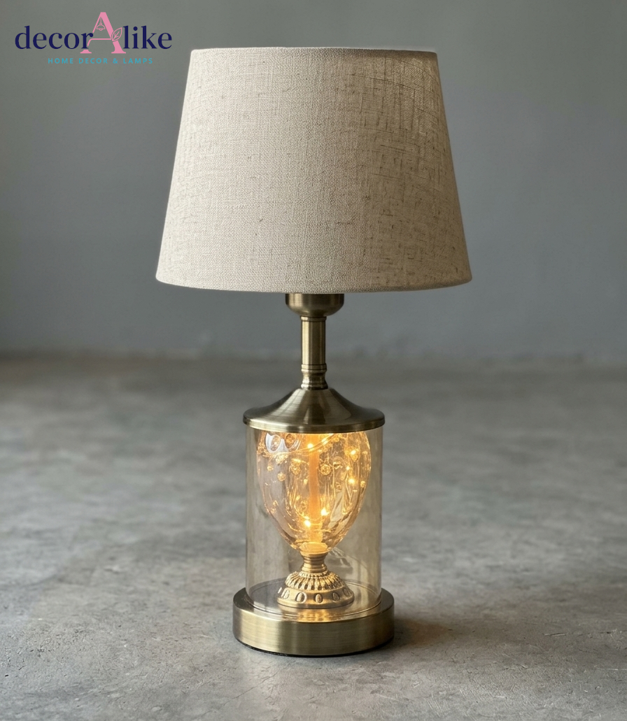 DecorAlike Fairy Lights Glass Cloche Table Lamp with Illuminated Golden Urn and Beige Linen Shade - Magical Lamp Pakistan
