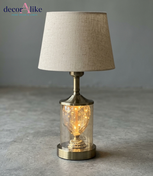 DecorAlike Fairy Lights Glass Cloche Table Lamp with Illuminated Golden Urn and Beige Linen Shade - Magical Lamp Pakistan