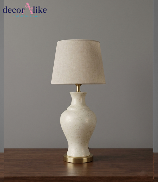 Speckled cream ceramic urn lamp with linen shade – brass base – Decoralike Lahore
