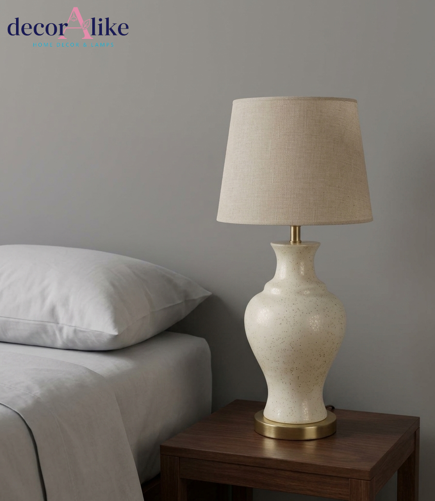 Speckled cream ceramic urn lamp with linen shade – brass base – Decoralike Lahore