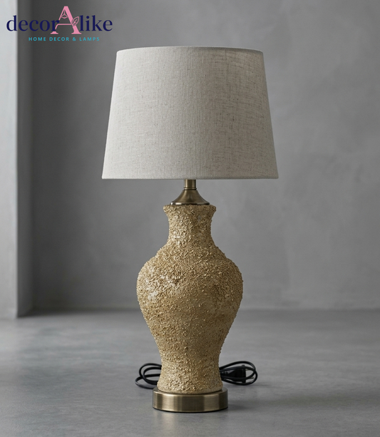 Textured sandstone-finish urn table lamp with linen shade – antique brass base – Decoralike Lahore