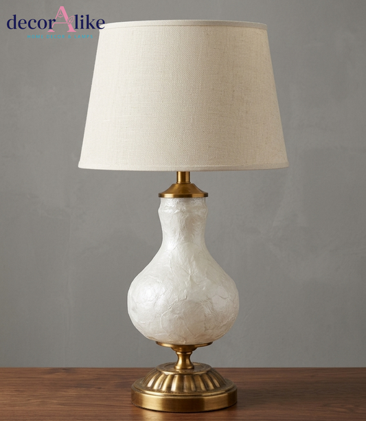 White mother of pearl table lamp with fluted antique brass pedestal base and beige linen shade — bedside lamp Pakistan