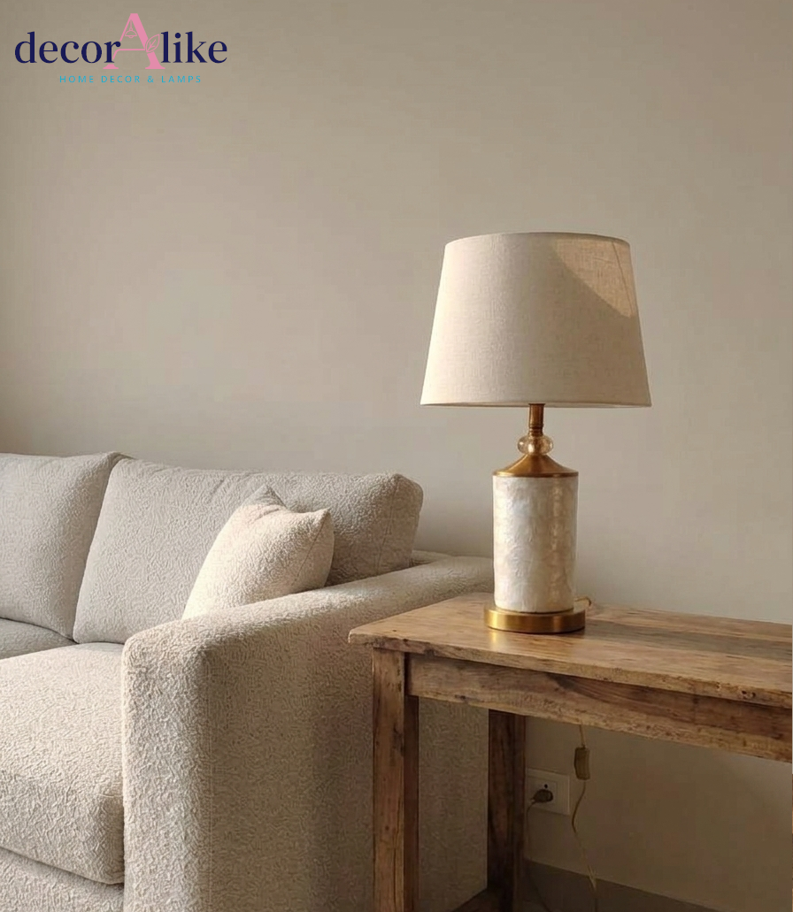 Capiz shell table lamp with gold fittings and crystal bead detail on wooden table — cream bedside lamp Pakistan