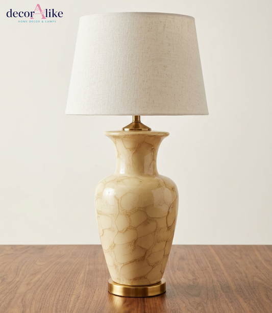 Cream marbled ceramic table lamp with brushed brass base and ivory linen shade — beige living room lamp Pakistan