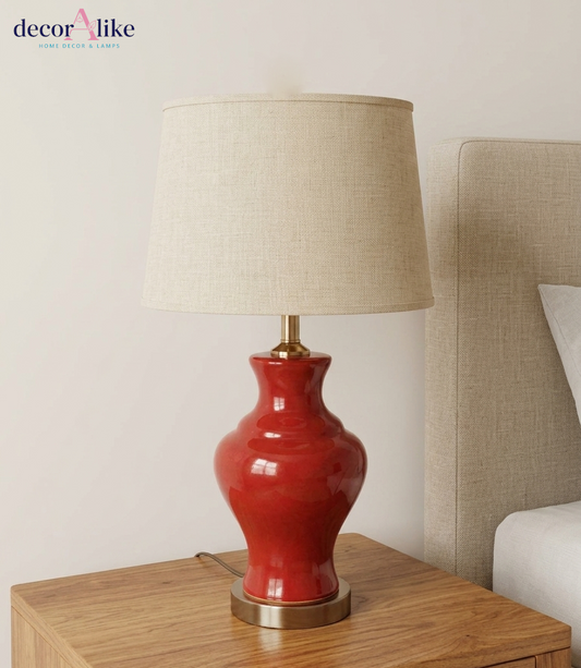 Red glossy ceramic table lamp with brass base and beige linen shade — coloured bedside lamp Pakistan