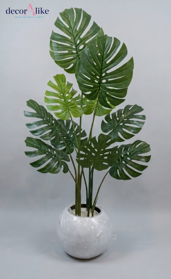 Artificial monstera plant with split leaves in white round planter by DecorAlike