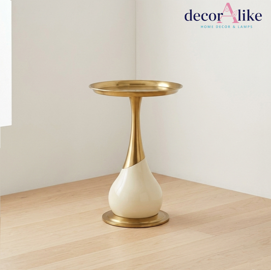 Sculptural round side table with brass stem and cream base – Decoralike Lahore