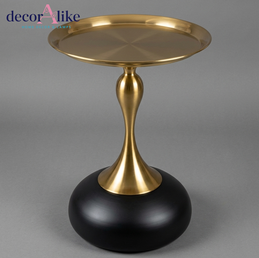 Gold pedestal side table with matte black round base - sculptural accent furniture Pakistan