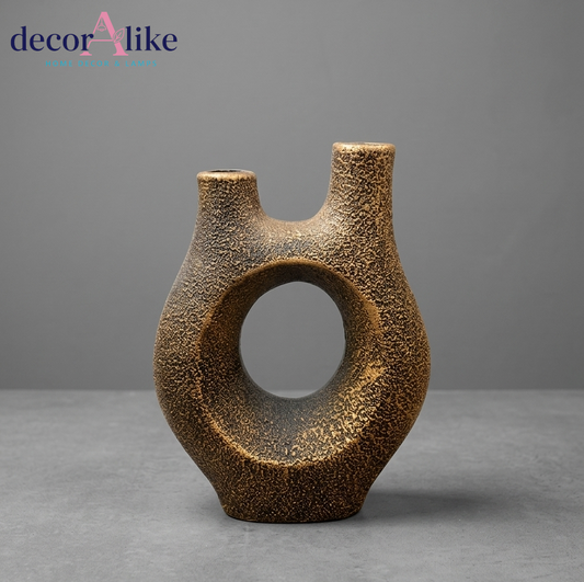 Sculptural double-neck donut vase with textured bronze finish – Decoralike Lahore